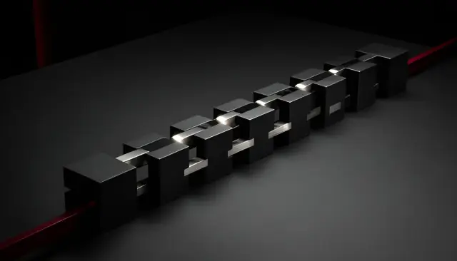 Blocos de metal preto encadeados em linha sobre mesa grafite, representando um workflow